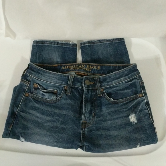 American Eagle Outfitters Other - American Eagle 360 Extreme Flex Medium Wash Distressed Skinny Jeans - size 28x30